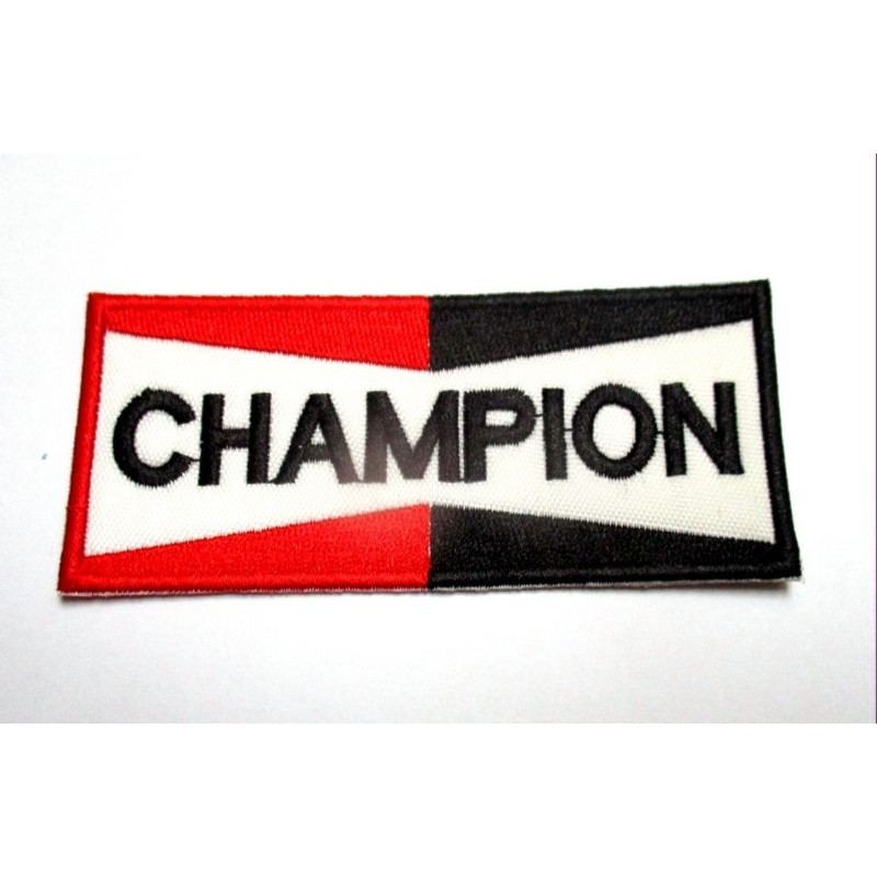 Parche bordado thermo-adhesivo Logo Champion.